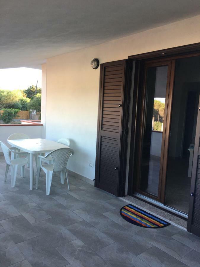 Casa Vacanze Porto Pino Apartment Exterior photo